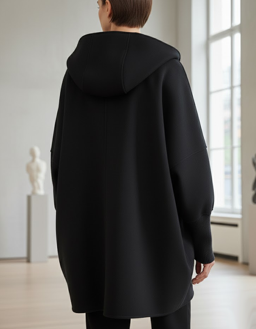 Manteau noir avec capuche et fermeture éclair