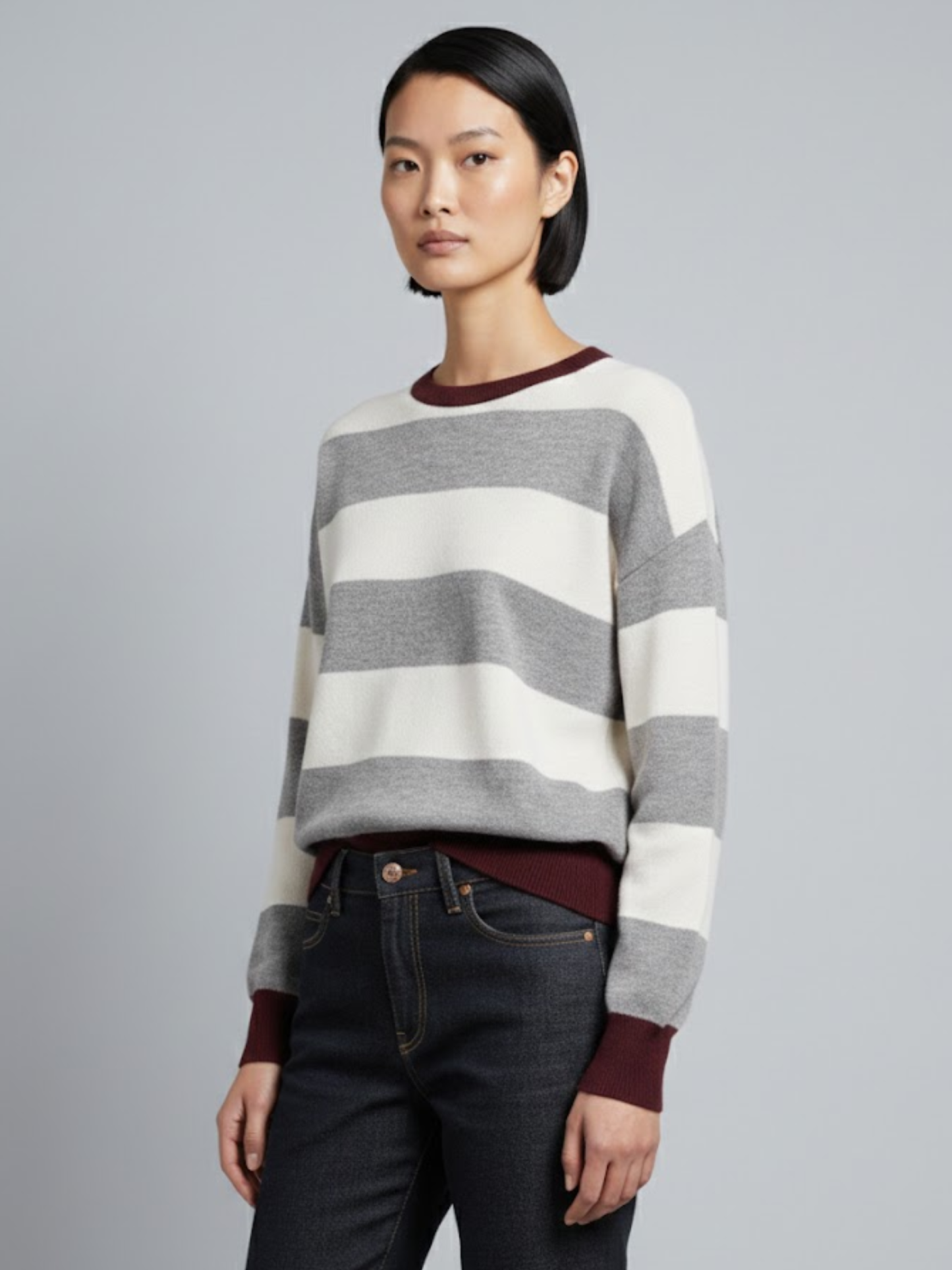 Striped long-sleeved sweater with a round neck