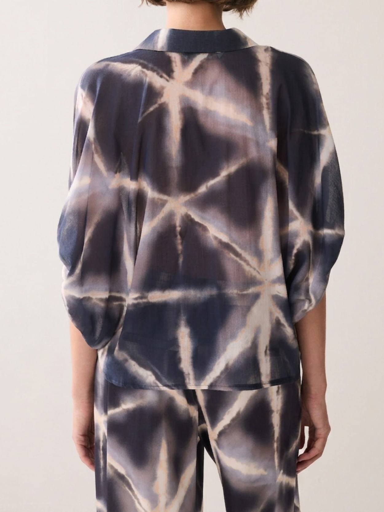 Sheer blouse with bow