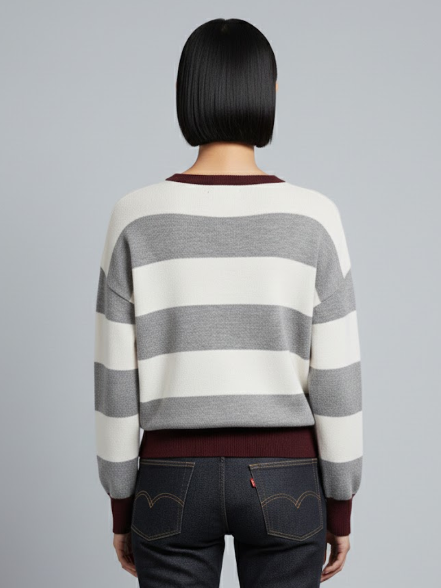 Striped long-sleeved sweater with a round neck