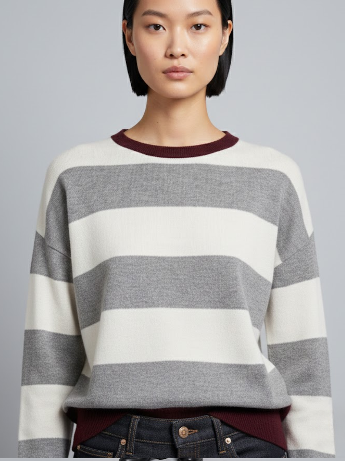 Striped long-sleeved sweater with a round neck