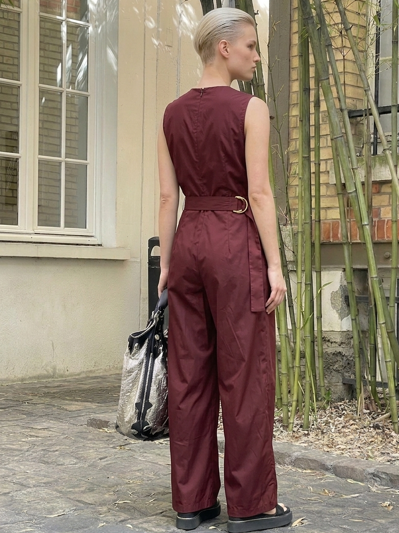 Cotton jumpsuit with crossover neckline and elegant drape