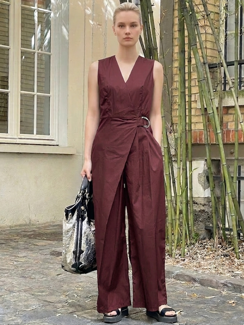 Cotton jumpsuit with crossover neckline and elegant drape