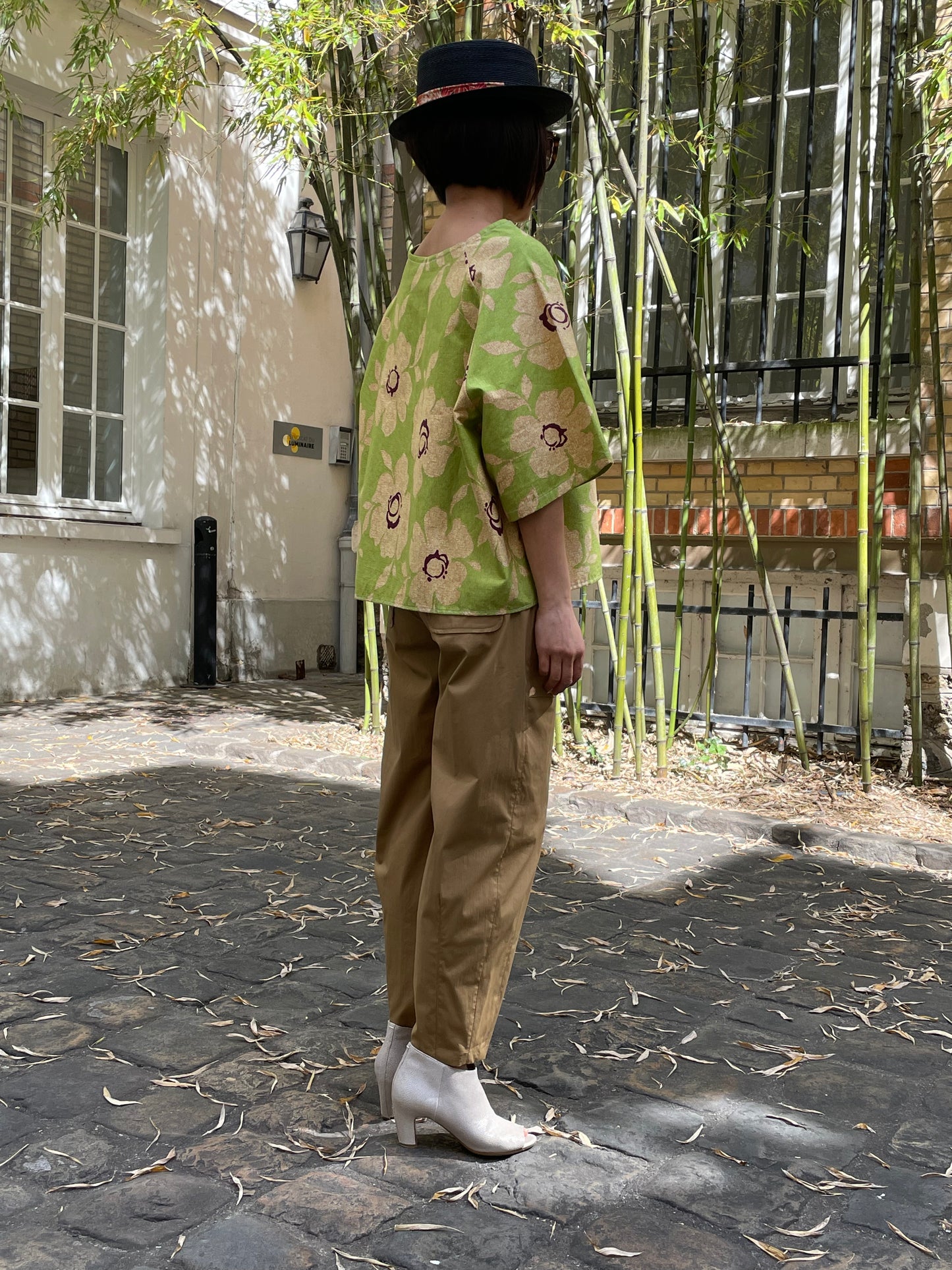 Green blouse with floral patterns