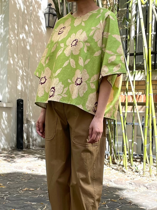 Green blouse with floral patterns