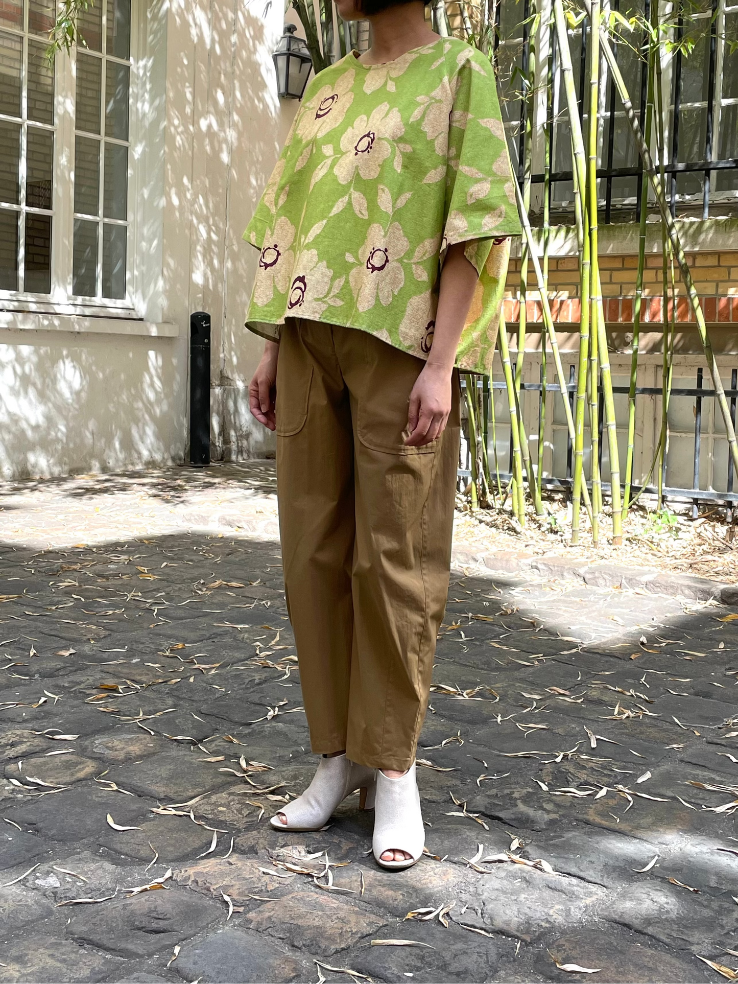 Green blouse with floral patterns