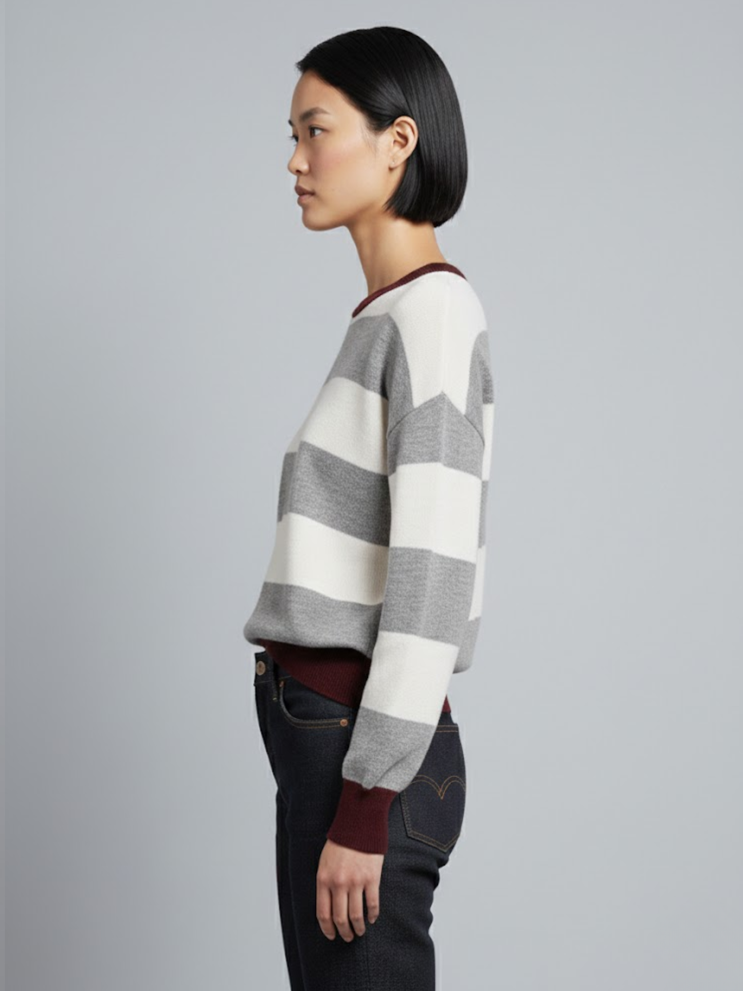 Striped long-sleeved sweater with a round neck