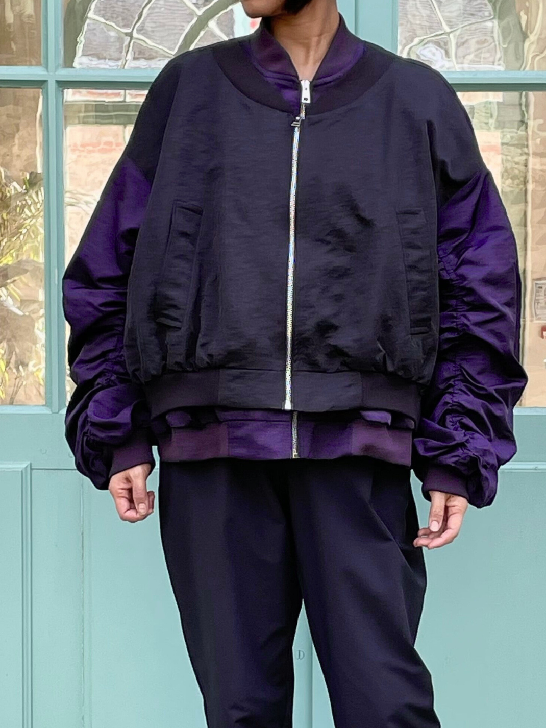 Bomber jacket with gathered sleeves and front zip